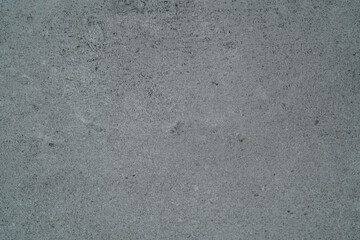 Blue toned concrete wall texture background with fine details and surface grain