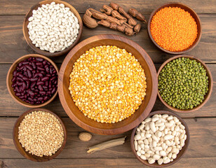 Various indigenous South African grains and legumes artistically arranged to highlight the country's diverse agricultural bounty.