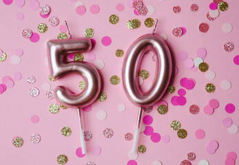 Celebrating a milestone birthday with sparkling decorations and candles