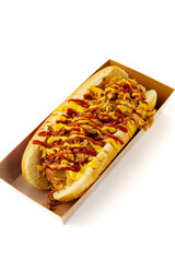 Hot dog close-up with bun and filling on white background
