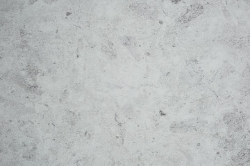 Textured gray concrete surface with subtle variations and patterns