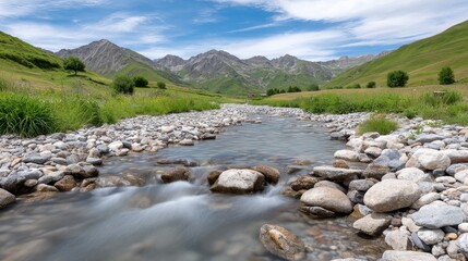 Serene Mountain Stream - A tranquil stream flows through a picturesque mountain valley, surrounded by lush green meadows and majestic peaks under a vibrant blue sky