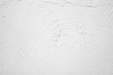 White textured wall with subtle patterns showcasing craftsmanship and simplicity