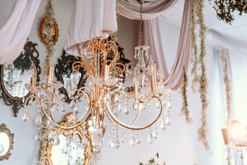 Elegant chandelier adorned with crystals in a stylish decor setting