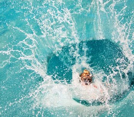 girl jump in sea unrecognizable