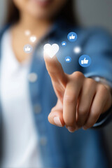 Engaging user touches virtual reactions on screen with heart and thumbs up icons
