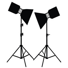 A black vector illustration shows a photographer silhouette with a camera and tripod in a professional studio with lighting equipment