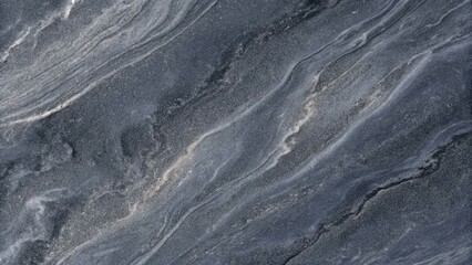 Striated surface pattern shows dark blue and gray marble texture with white highlights