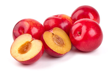 Red plums, fresh and ripe fruit isolated on white background.