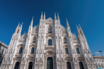 The roof of the Duomo di Milano in Italy features a view of Gothic architecture and artistic designs