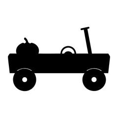 Black silhouette of a toy wagon carrying a pumpkin for Halloween season