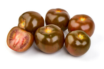 Fresh ripe kumatoes, isolated on white background.