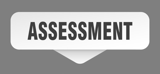 assessment sticker. assessment sign isolated on gray background