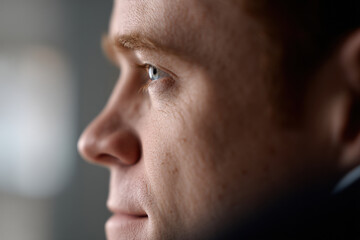 Obraz premium portrait of land surveyor with attentive expression positioned on left side of frame