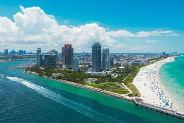 Fototapeta premium Aerial view of Miami Beach skyline. Drone shot of Miami Beach cityscape. Top view of South Miami Beach and the ocean. Miami Beach skyline with skyscrapers and coastline from above.