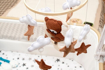 Baby crib mobile with moon, bear, stars and clouds