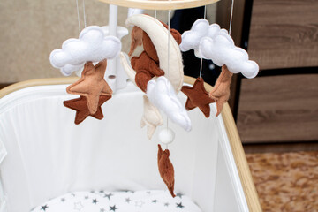 Baby crib mobile with moon, bear, stars and clouds