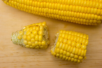Sweet Yellow Corn On A Wooden cutting board.