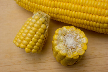 Sweet Yellow Corn On A Wooden cutting board.