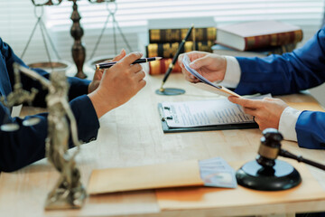 A client submits legal documents to an attorney, providing detailed case information for review and...