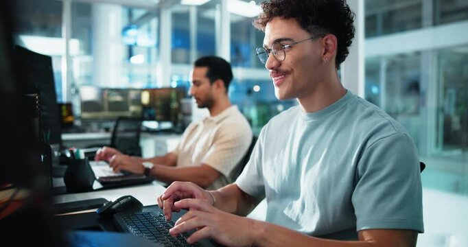Computer, face and typing with man programming at desk in office for coworking or software development. Business, coding and keyboard with happy developer or programmer at work for web design