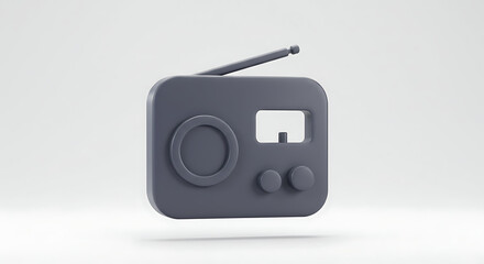 A gray, rounded rectangular, monochromatic vintage radio with an antenna is displayed against a plain white background in a studio setting.