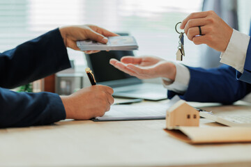 Client pays the agent, who hands over the house keys, marking the official closing and completion of the real estate transaction.