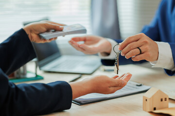 Client pays the agent, who hands over the house keys, marking the official closing and completion...