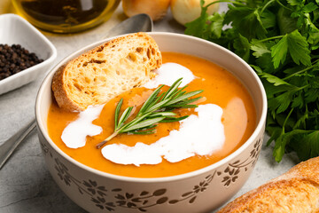 Delicious lentil, ezogelin or pumpkin soup on stone  background