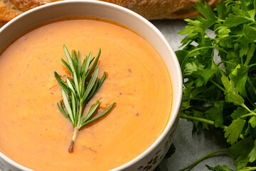 Delicious lentil, ezogelin or pumpkin soup on stone  background