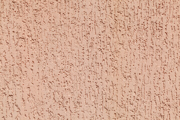 Wall with a textured surface in a light color