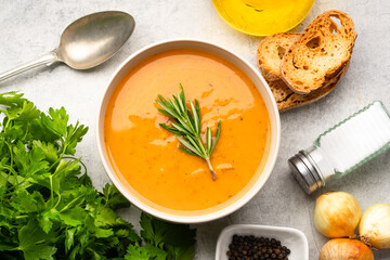Delicious lentil, ezogelin or pumpkin soup on stone  background
