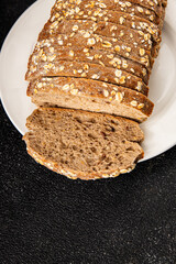 Oat bread oatmeal wholegrain pastry natural food fresh delicious gourmet food background on the table rustic food top view copy space