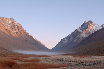 Fototapeta premium glacial valley in chile at sunrise showcasing dramatic contrasts between icy landscape and warm hues of dawn