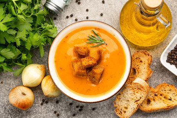 Delicious lentil, ezogelin or pumpkin soup on stone  background