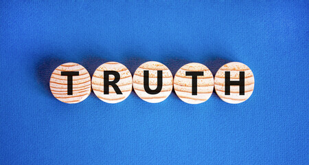 Truth symbol. Concept word Truth on beautiful wooden circles. Beautiful blue table blue background....