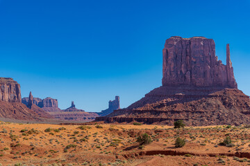 Left, West Mitten Rock Formation Within Monument Valley Arizona