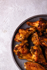 Baked spicy chicken wings with sauce