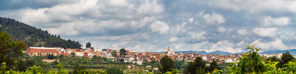 Beautiful landscape with a village on background, in Montixelvo, Comunidad Valenciana (Spain).