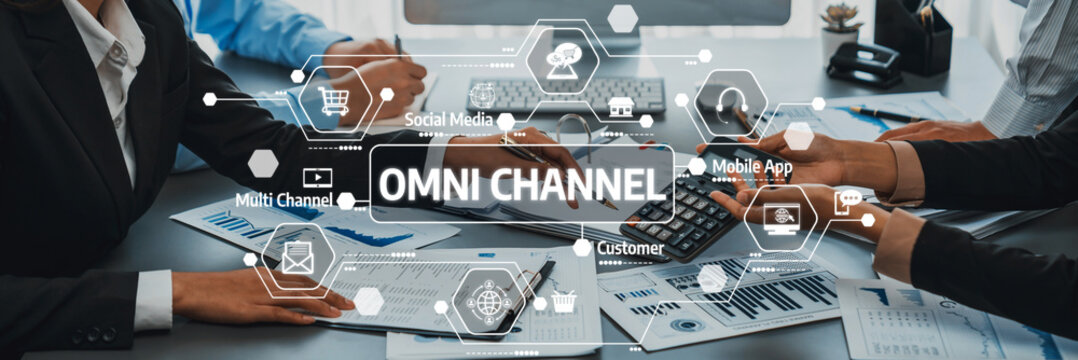 A dynamic business meeting showcasing collaboration on omni channel strategies. Teams utilize digital tools and analytics to improve customer engagement and service. Amity