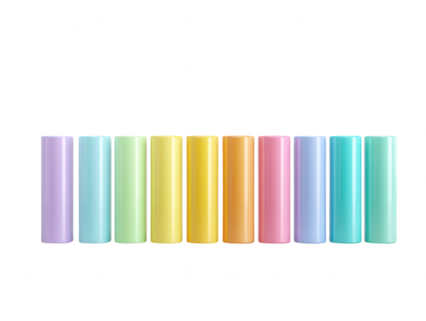 Eleven pastel colored cylindrical objects stand in a neat row against a bright white background in this cheerful and minimalist studio shot composition.