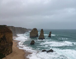 Rocky coastline during overcast weather, dramatic waves crashing against sea stacks