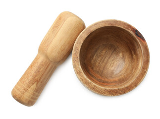 Wooden mortar with pestle isolated on white, top view