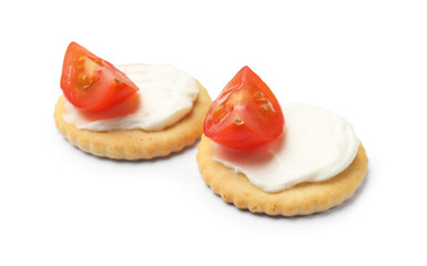Tasty crackers with cream cheese and tomatoes isolated on white