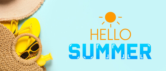 Beach bag with flip flops, hat and sunglasses on blue background © Pixel-Shot