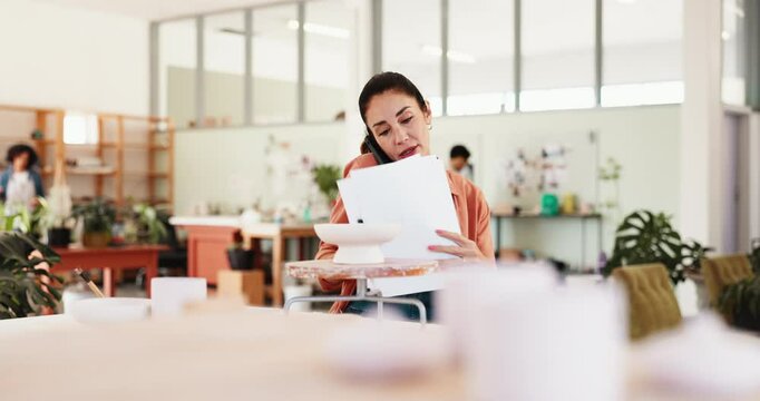 Woman, document and phone call with pottery, class and schedule checklist for lesson. Ceramic manager, thinking and paperwork with clay pot, stock and designer in small business, studio or retail