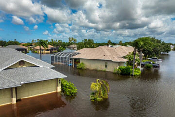 Hurricane Debby tropical rainstorm flooded residential homes in suburban community in Sarasota,...