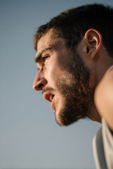 Obraz premium dynamic portrait of runner on left side moment of determination and joy as he faces obstacle