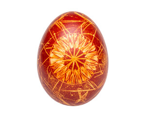 A golden and red Easter egg with an orange pattern on it isolated on a transparent background