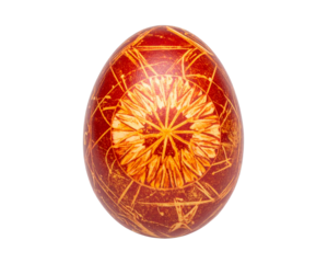 A golden and red Easter egg with an orange pattern on it isolated on a transparent background